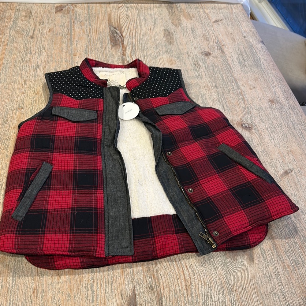 New with tags plaid vest with Sherpa inside